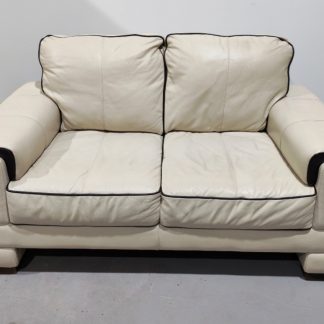 Cream Two Seater Sofa With Brown Piping